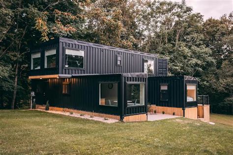 metal container house|converted shipping containers into homes.